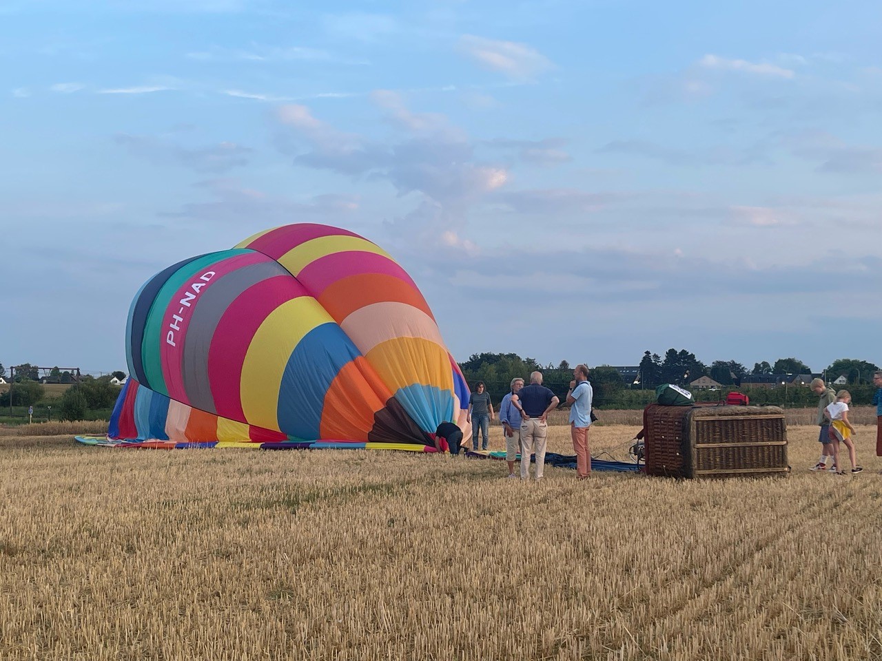 Preparing a colourful hot air balloon with the crew